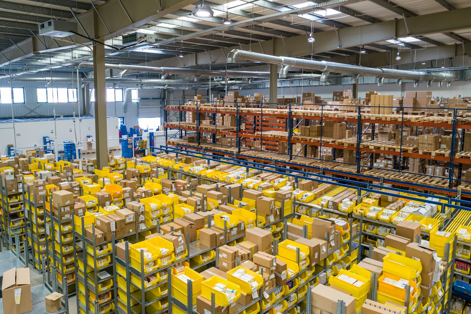 Warehouse logistics floor with packed cargo and organized handling lanes
